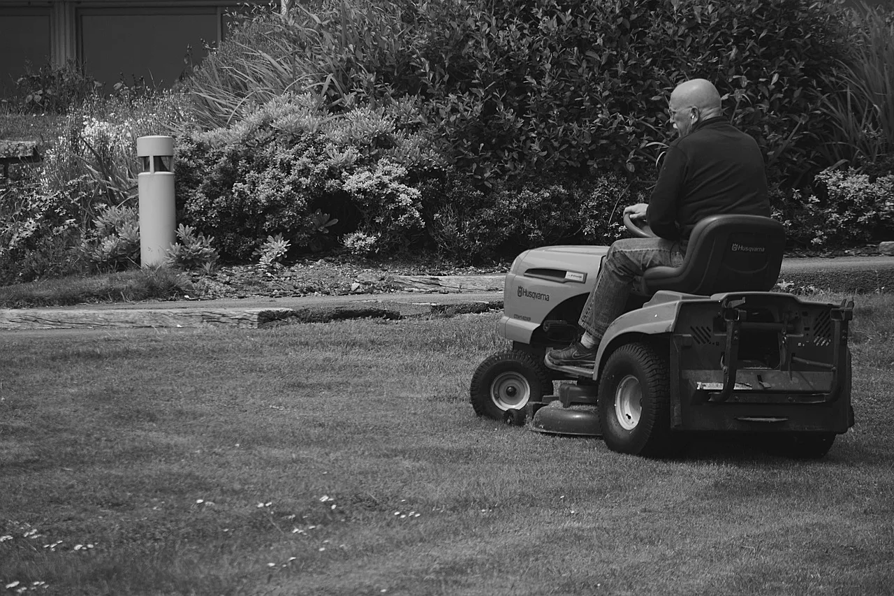 man, grass, black and white, lawn mower, mowing, nature, works, worker, garden. How Dallas-Fort Worth lawn care companies win HOA contracts